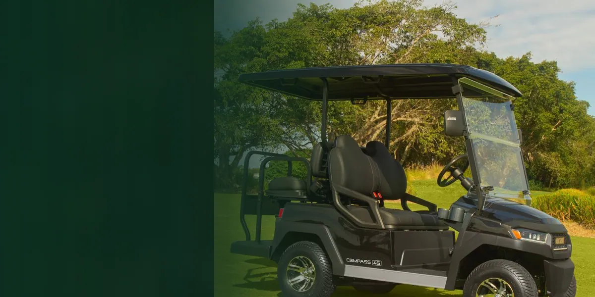 Buggies for sale in Australia: black ECAR Compass 4 seat golf cart on a green fairway